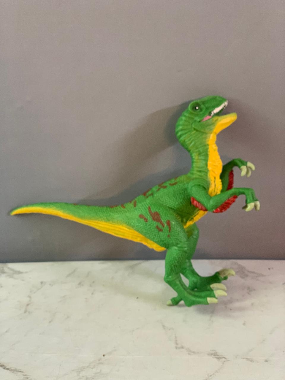 Schleich Green Velociraptor Dinosaur Figure. (Rs 200 advance)