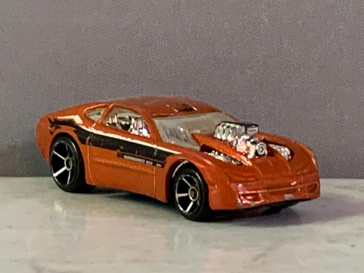 Hot Wheels HW Designs '09 Orange Overbored 454 Toy Car.