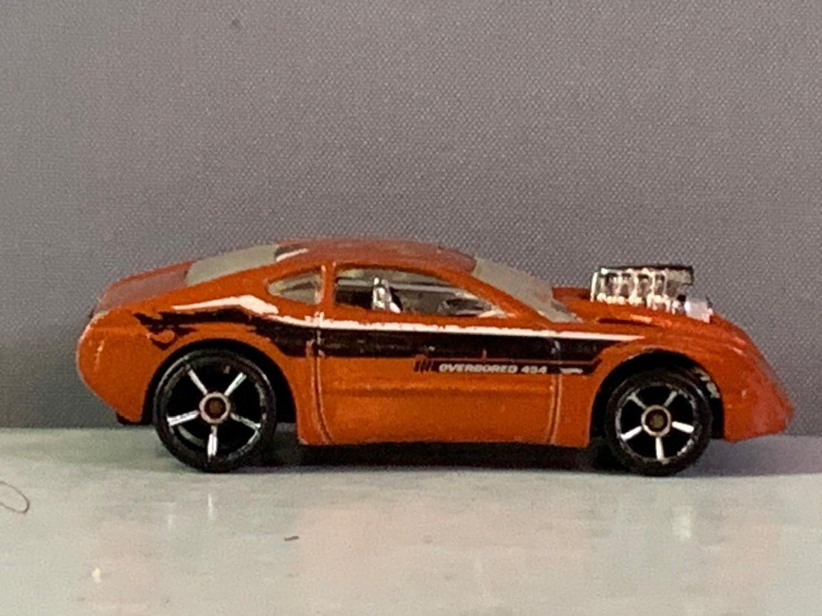 Hot Wheels HW Designs '09 Orange Overbored 454 Toy Car.