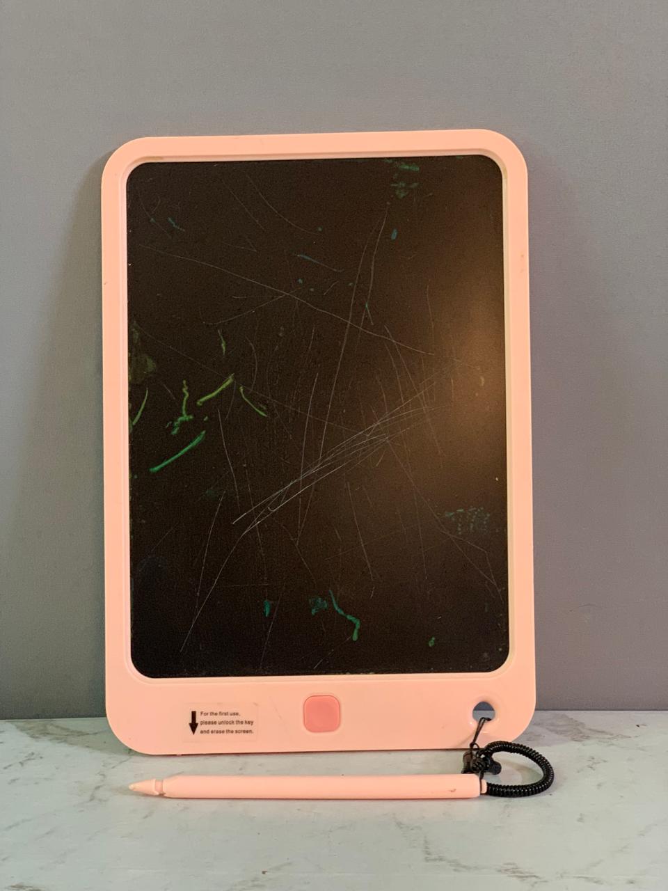 Electronic LCD Writing Tablet.(condition 8/10, must check video)(Rs 200 advance)