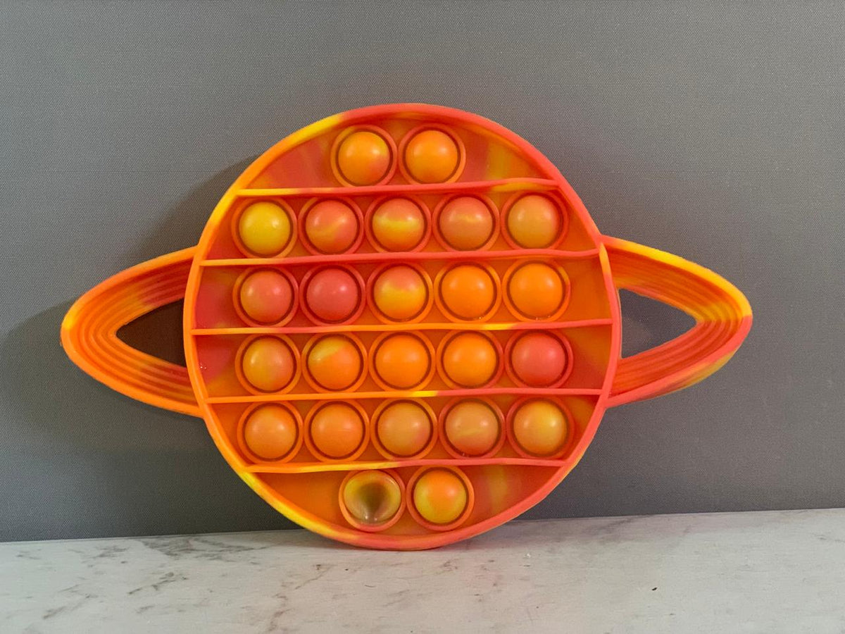 Saturn-Shaped Sensory Fidget Toy. (Rs 100 advance)