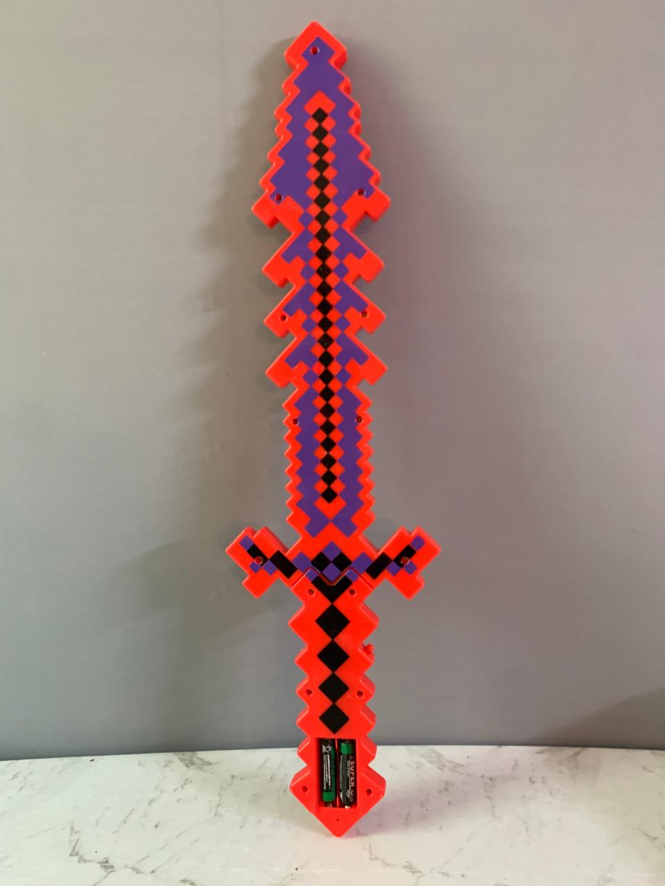 Minecraft Sword With Lights and Spounds(batteries cover missing) (Rs 200 advance)