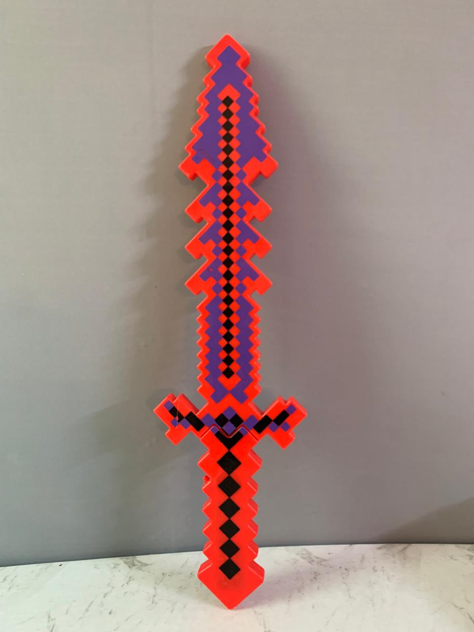 Minecraft Sword With Lights and Spounds(batteries cover missing) (Rs 200 advance)