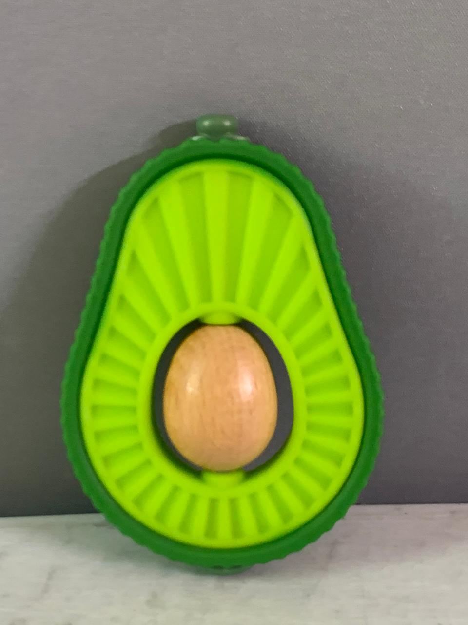 Nuby Avocado Muncher Wood and Silicone Teether.(Rs 100 advance)