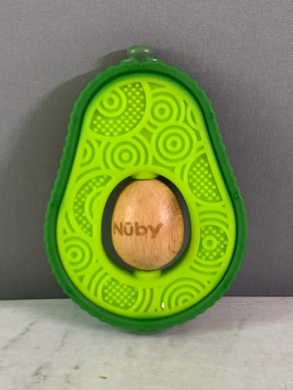 Nuby Avocado Muncher Wood and Silicone Teether.(Rs 100 advance)