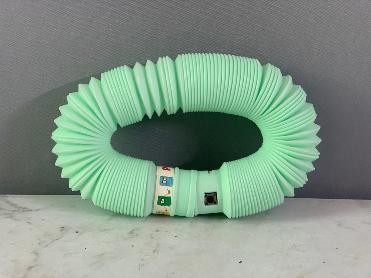 Light-Up Pop Tube Fidget Toy.(Rs 150 advance)(Assorted Colors)