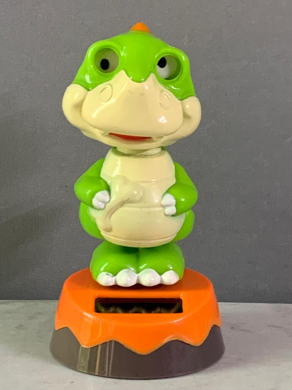 Greenbrier Solar Powered Dancing Dinosaur Bobblehead.