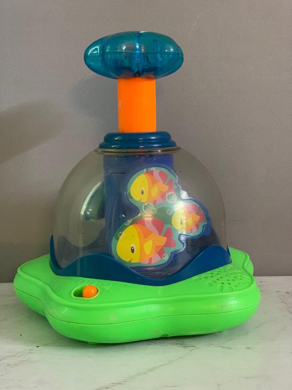 Bright Starts Press & Glow Spinner. ( Rs 150 advance)