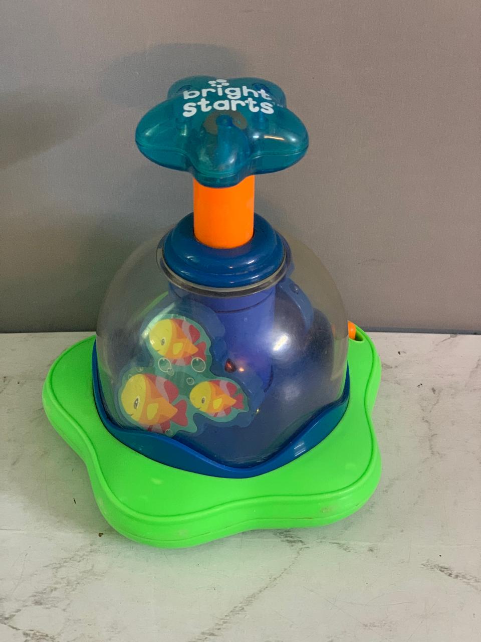 Bright Starts Press & Glow Spinner. ( Rs 150 advance)