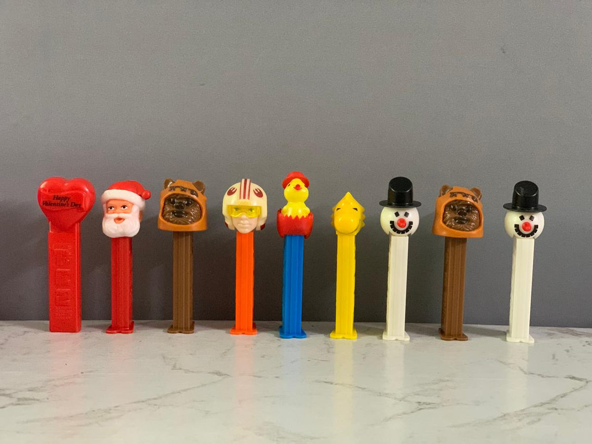 PEZ Candy Dispensers.(9 pcs)  ( Rs 200 advance )