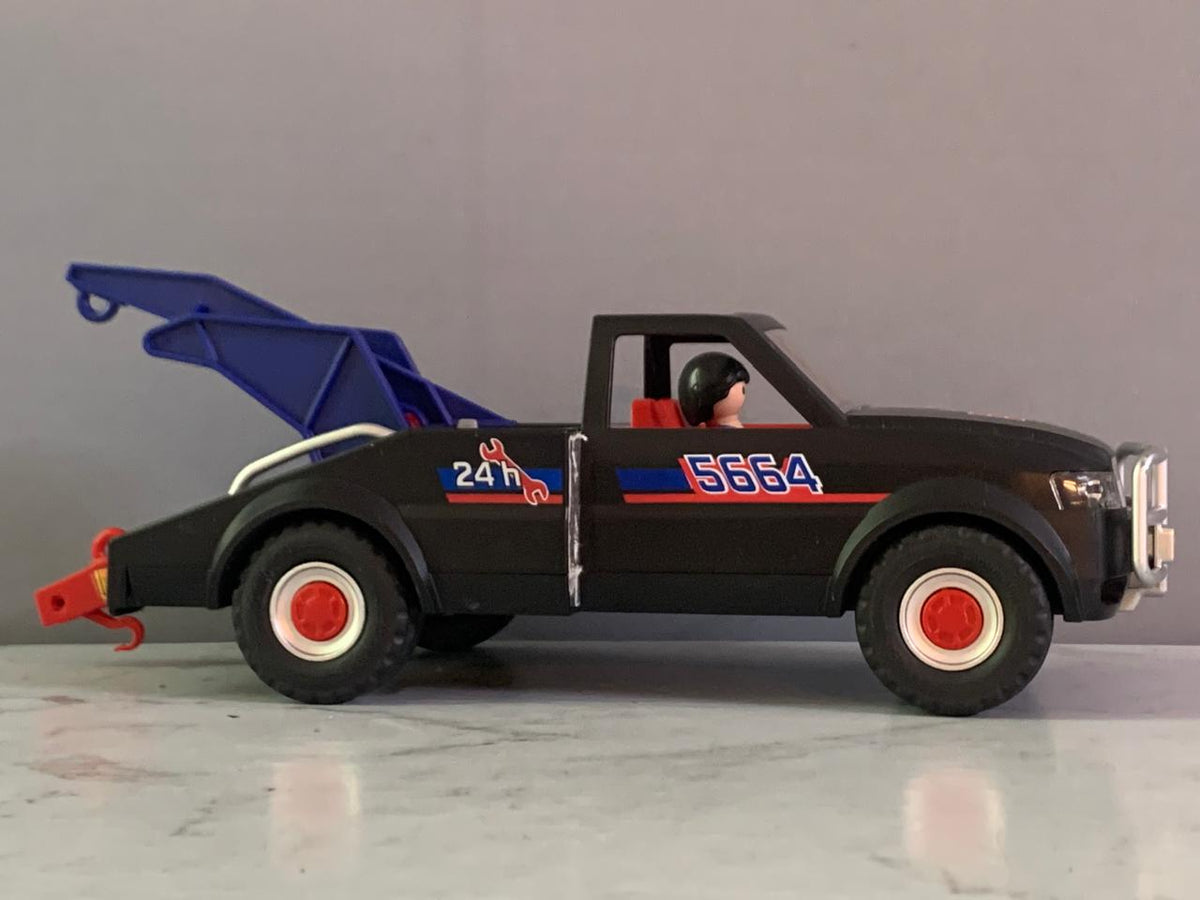 Playmobil City Action Tow Truck.   (Rs 250 advance )