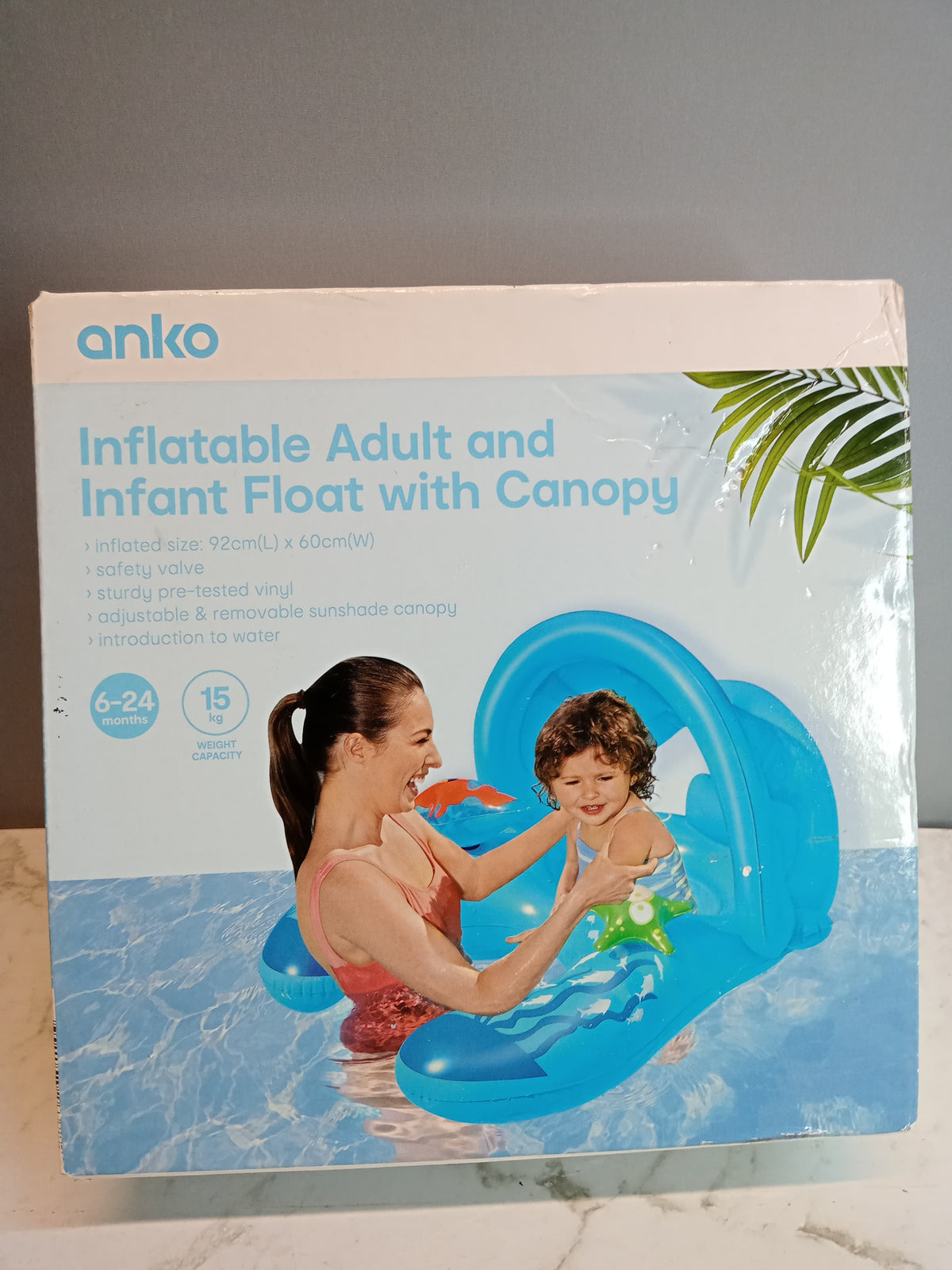 Anko inflatable adult and infant float with canopy.Rs.3500-H110824014.new