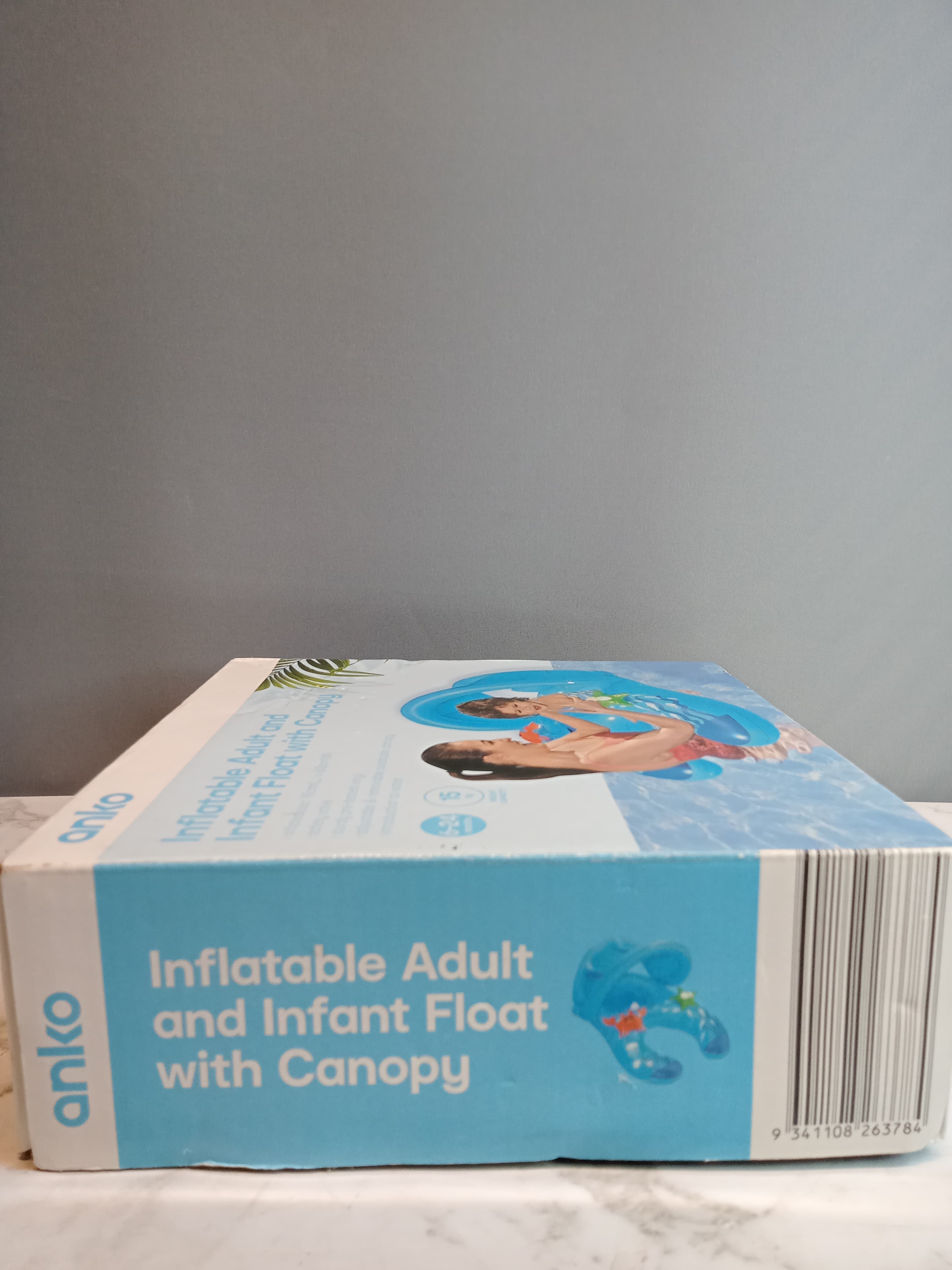 Anko inflatable adult and infant float with canopy.Rs.3500-H110824014.new