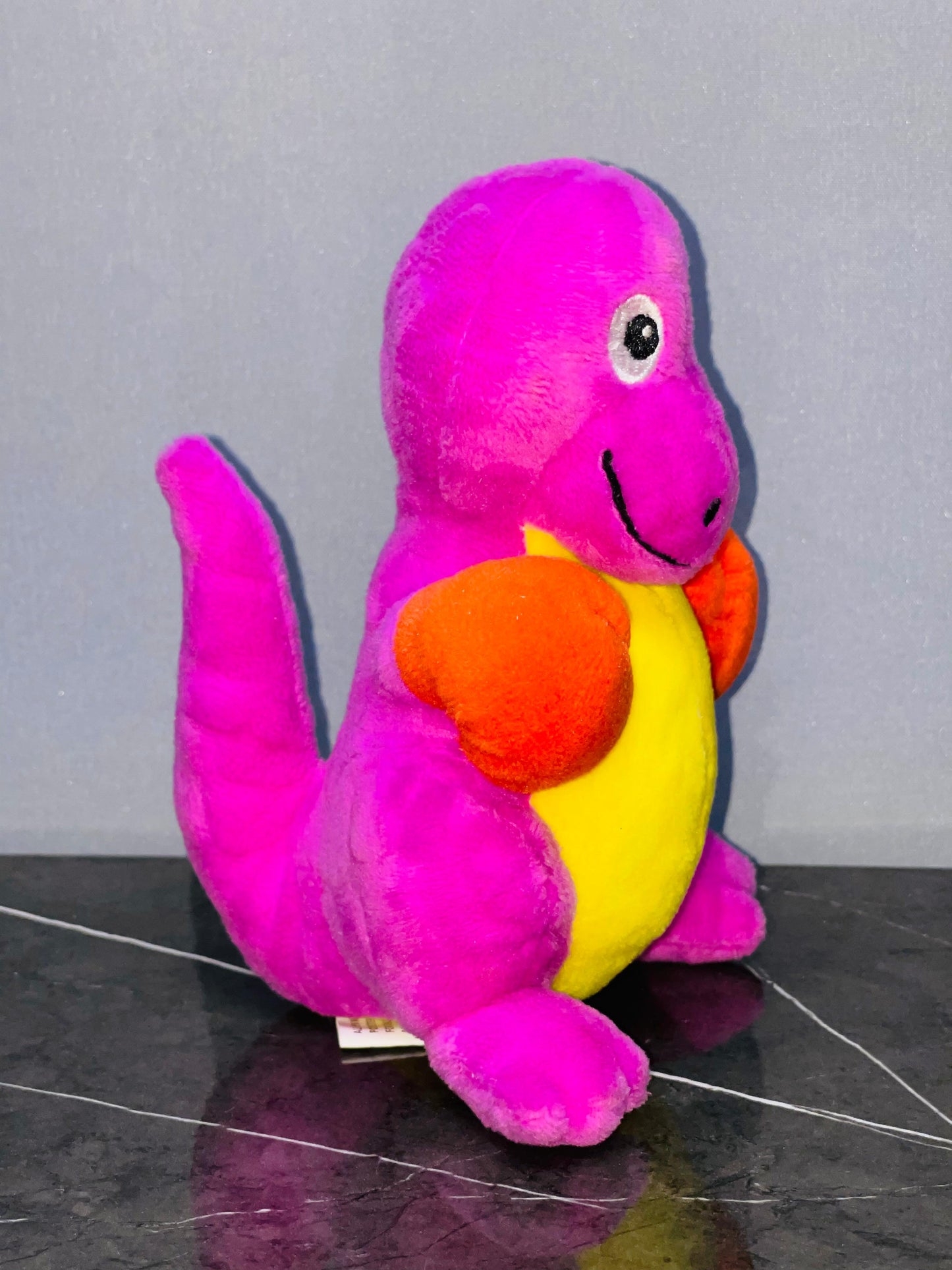 Cheerful Purple and Yellow Dino Plush