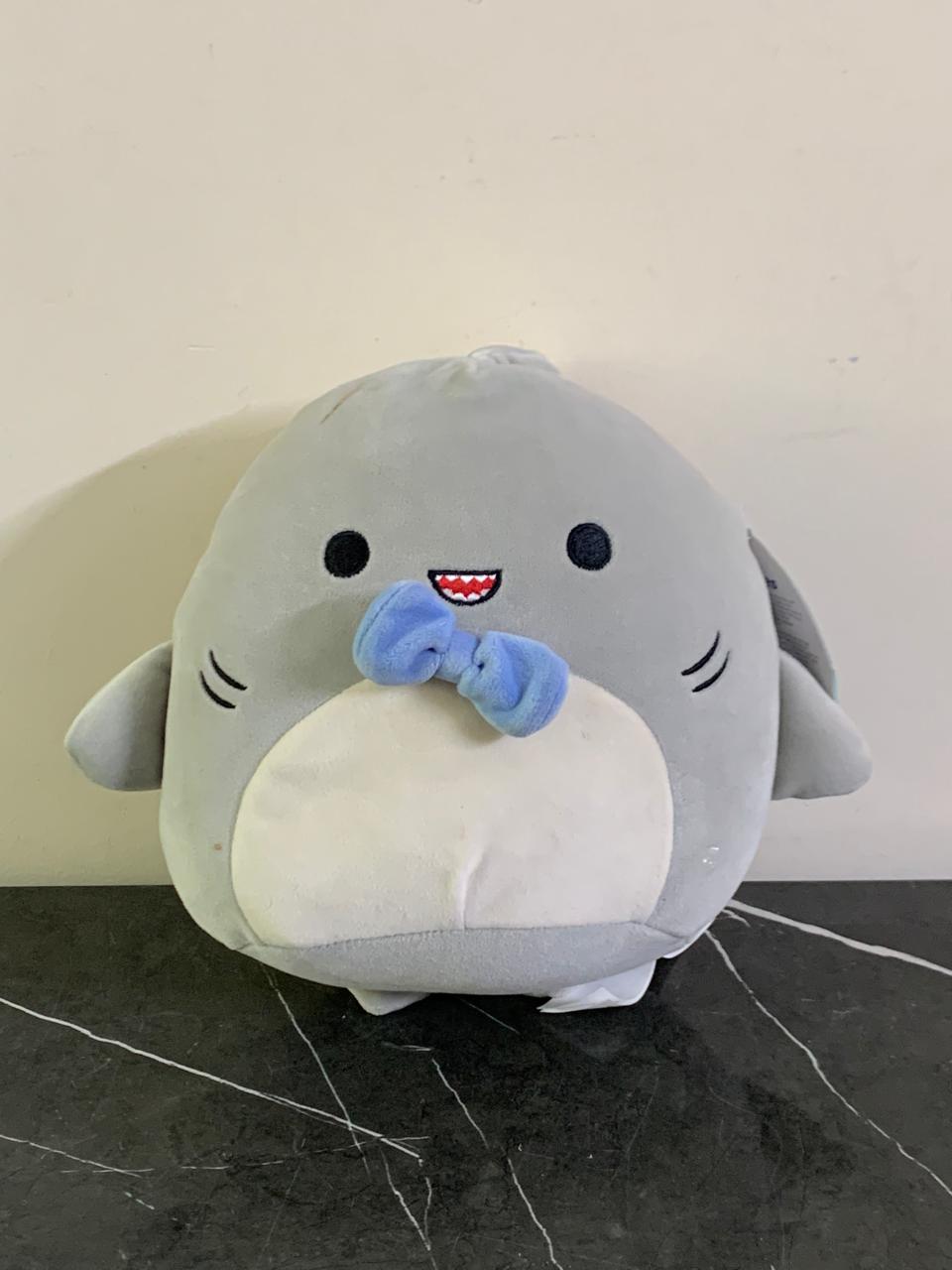 Squishmallows Gordon the Grey Shark with Blue Bowtie. SKU:BXL-119