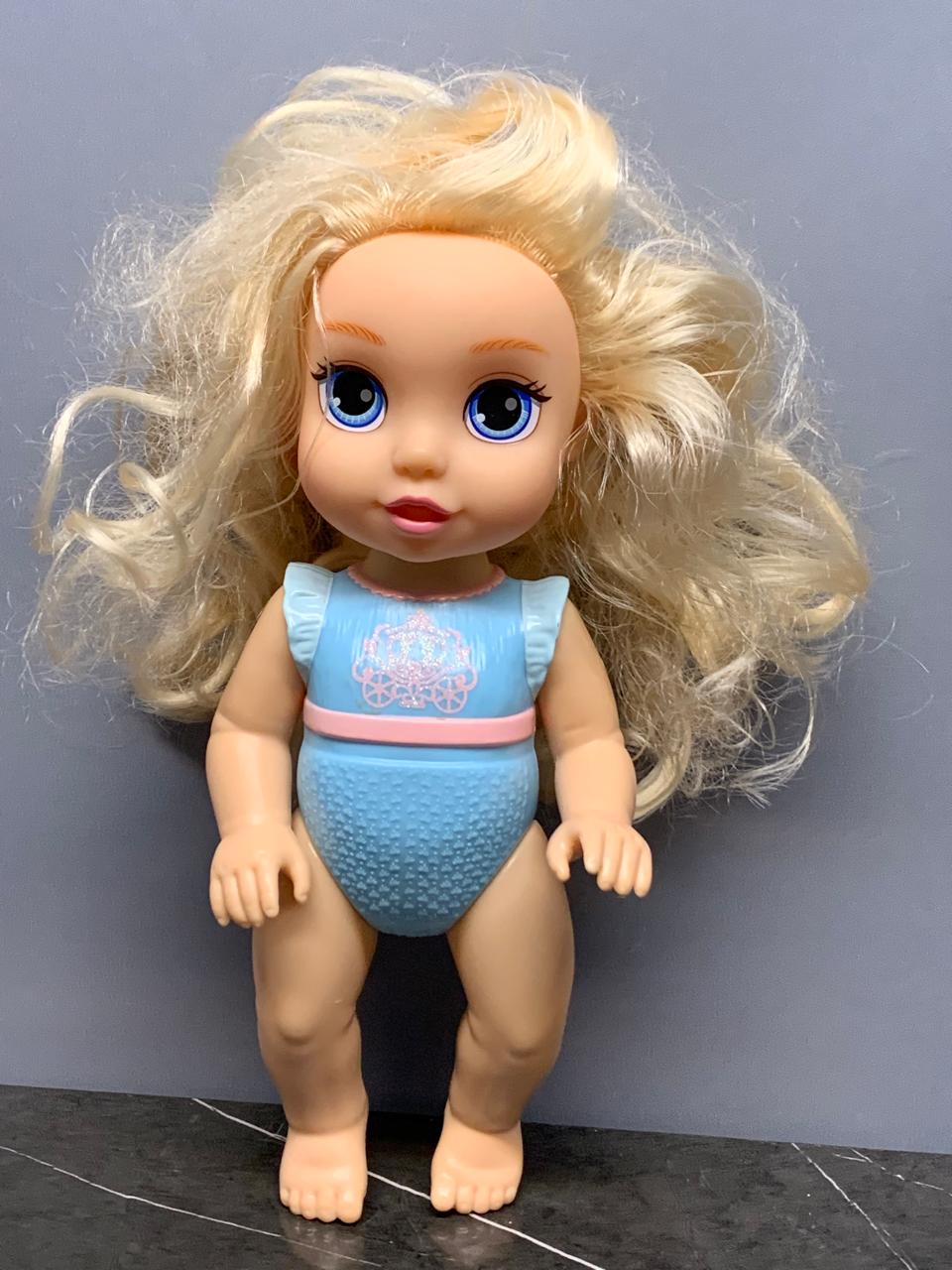 Blonde-Haired Baby Doll in Blue Swimsuit