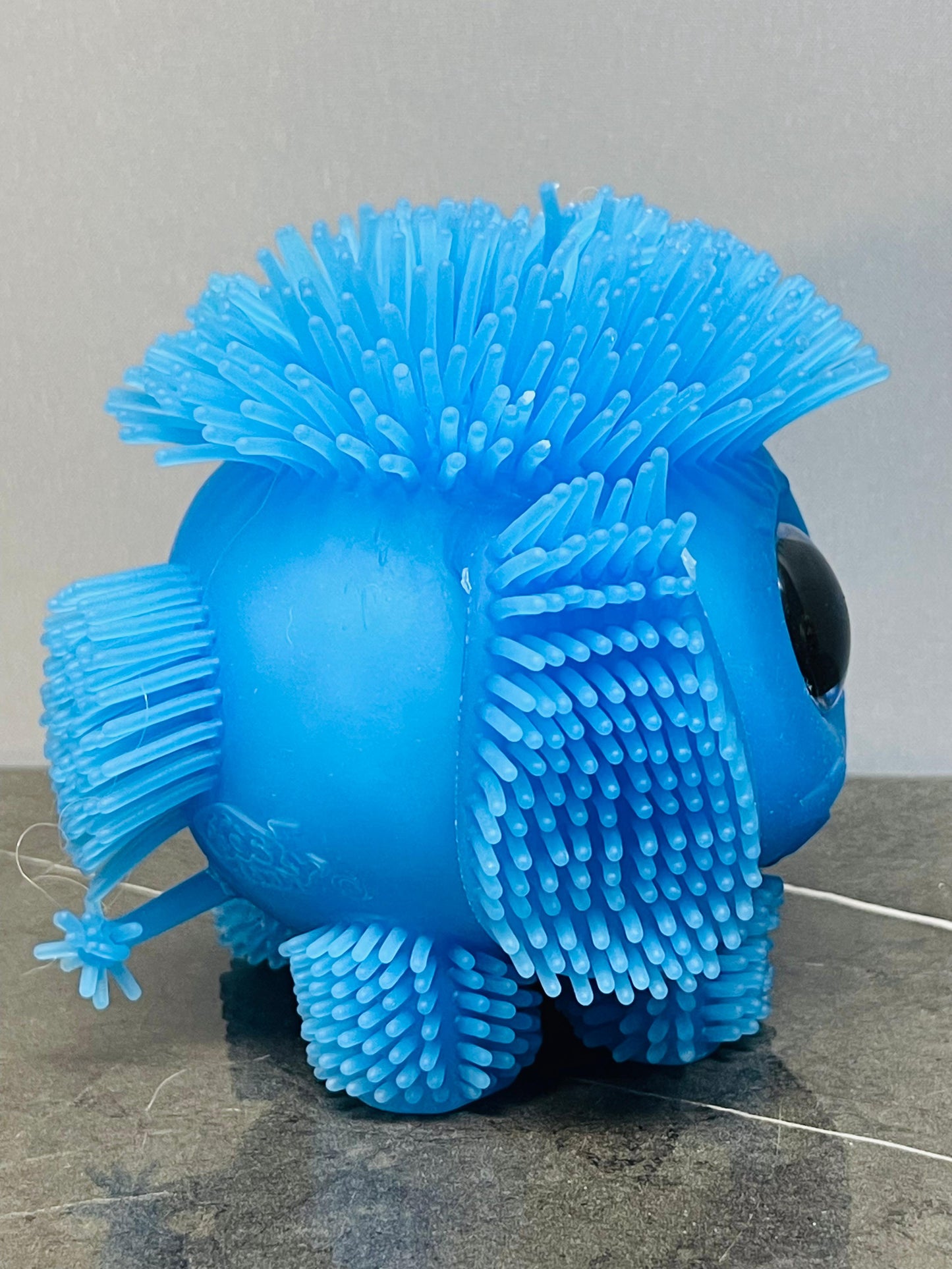 Googly-Eyed Spiky Creature Toy