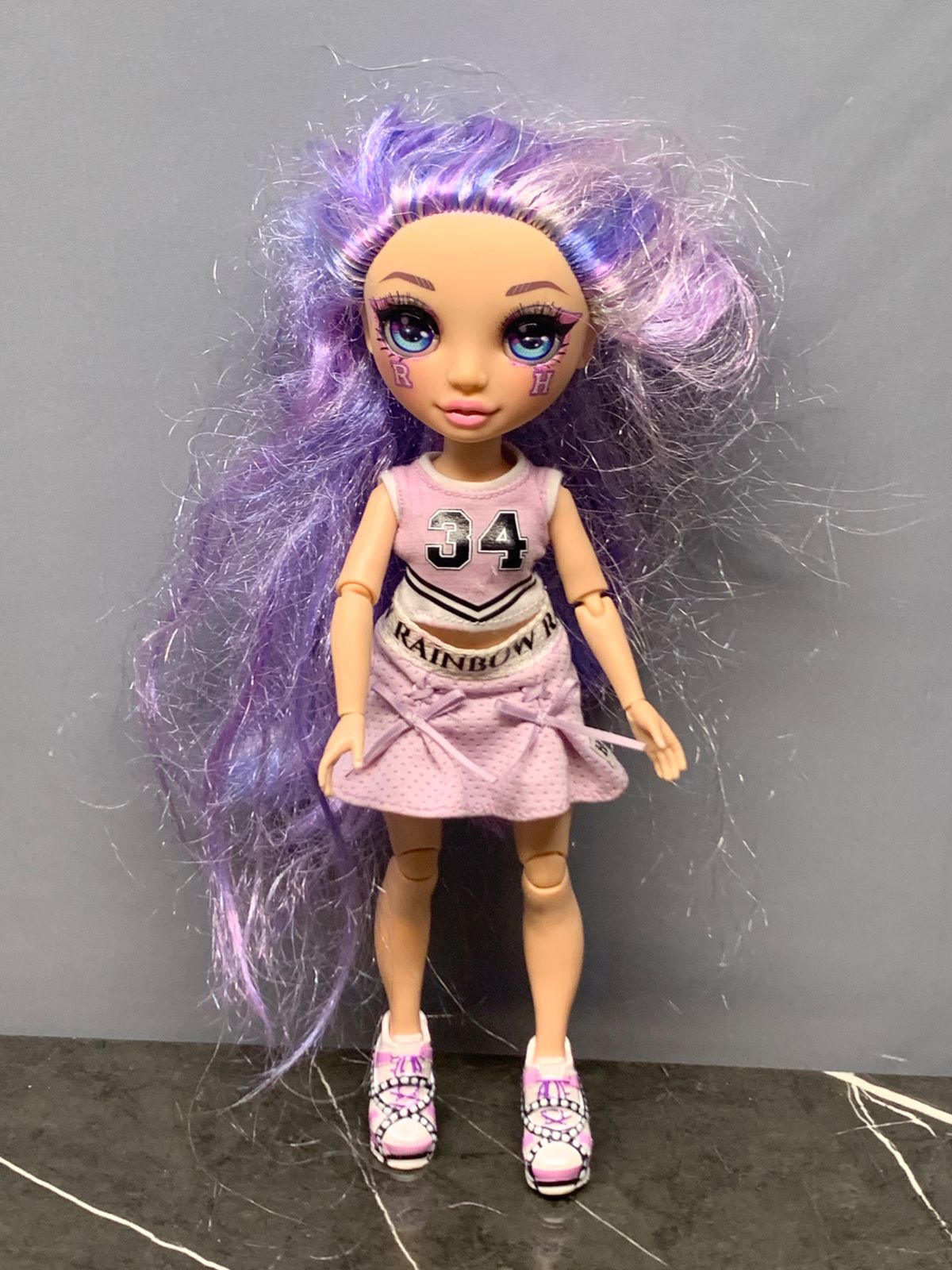 Rainbow High Cheer Violet Willow Fashion Doll.