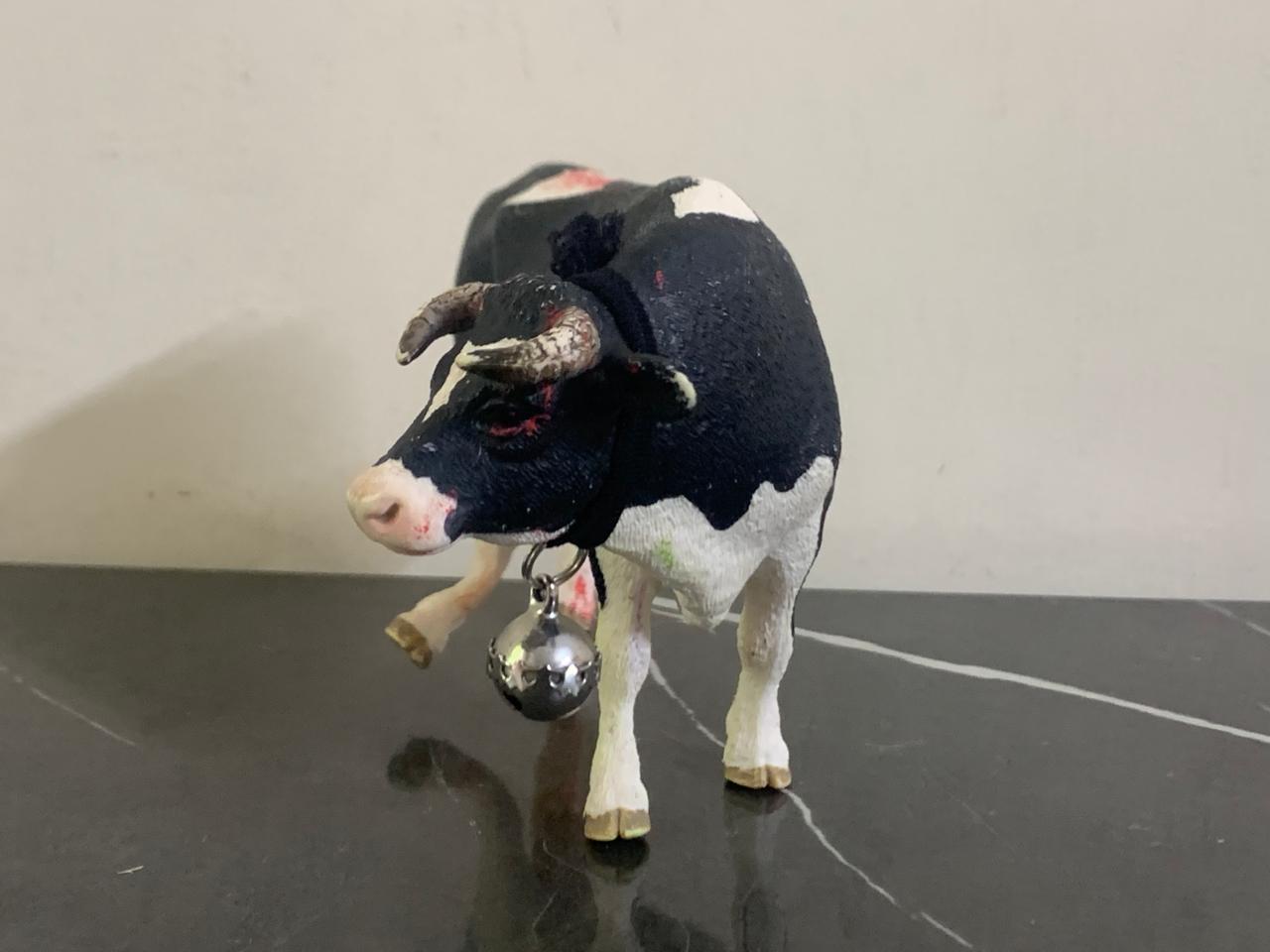 Schleich Holstein Bull Toy Figurine. SKU:BXL-059 (one leg bended)