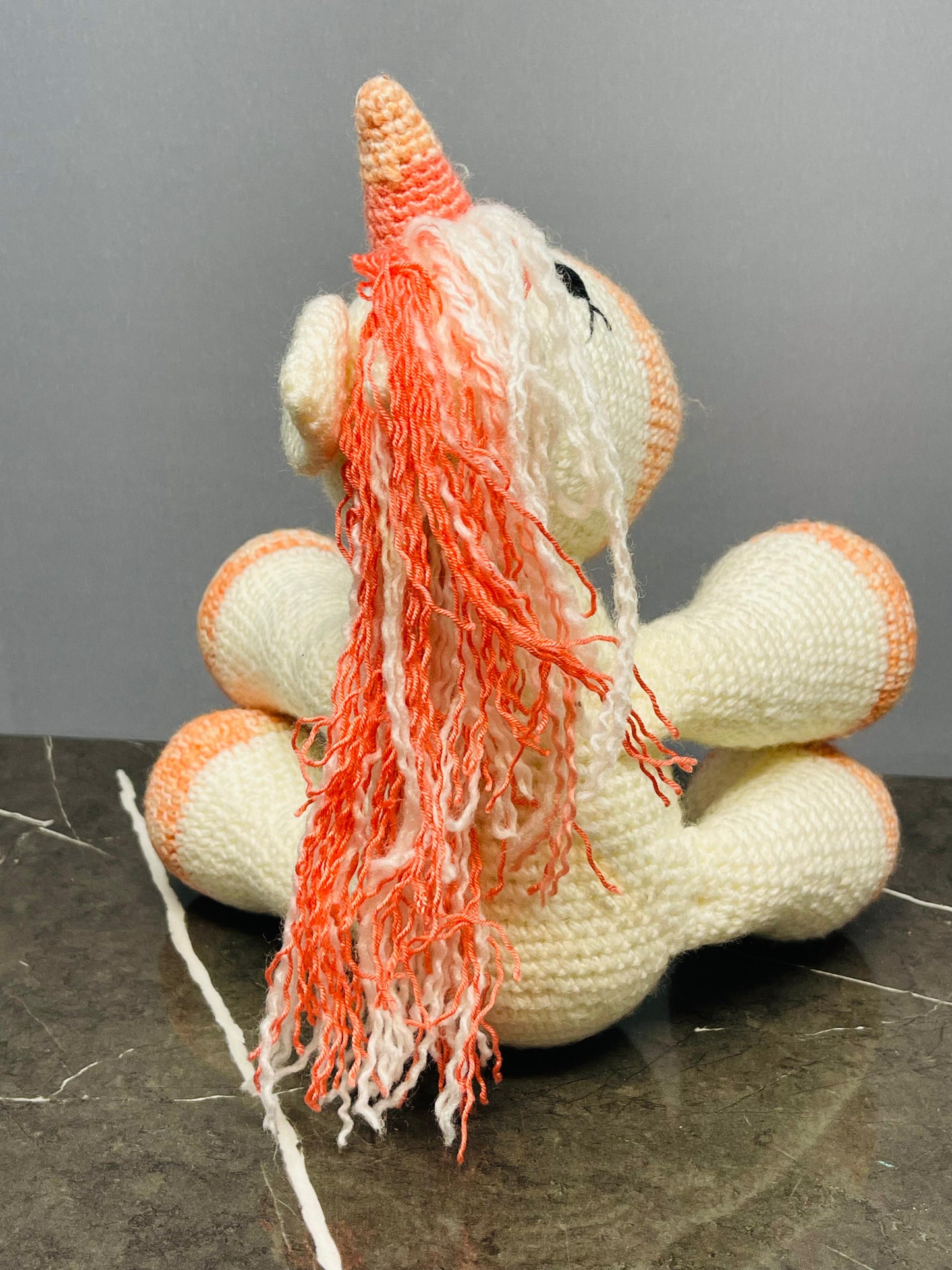 Crocheted Unicorn Plush Toy.