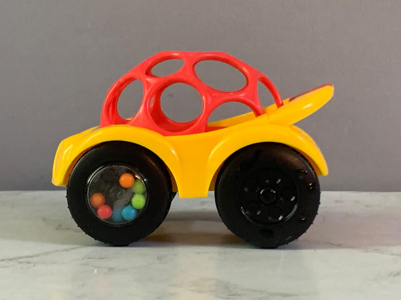 Bright Starts Oball Rattle & Roll Car. (Rs 100 advance)