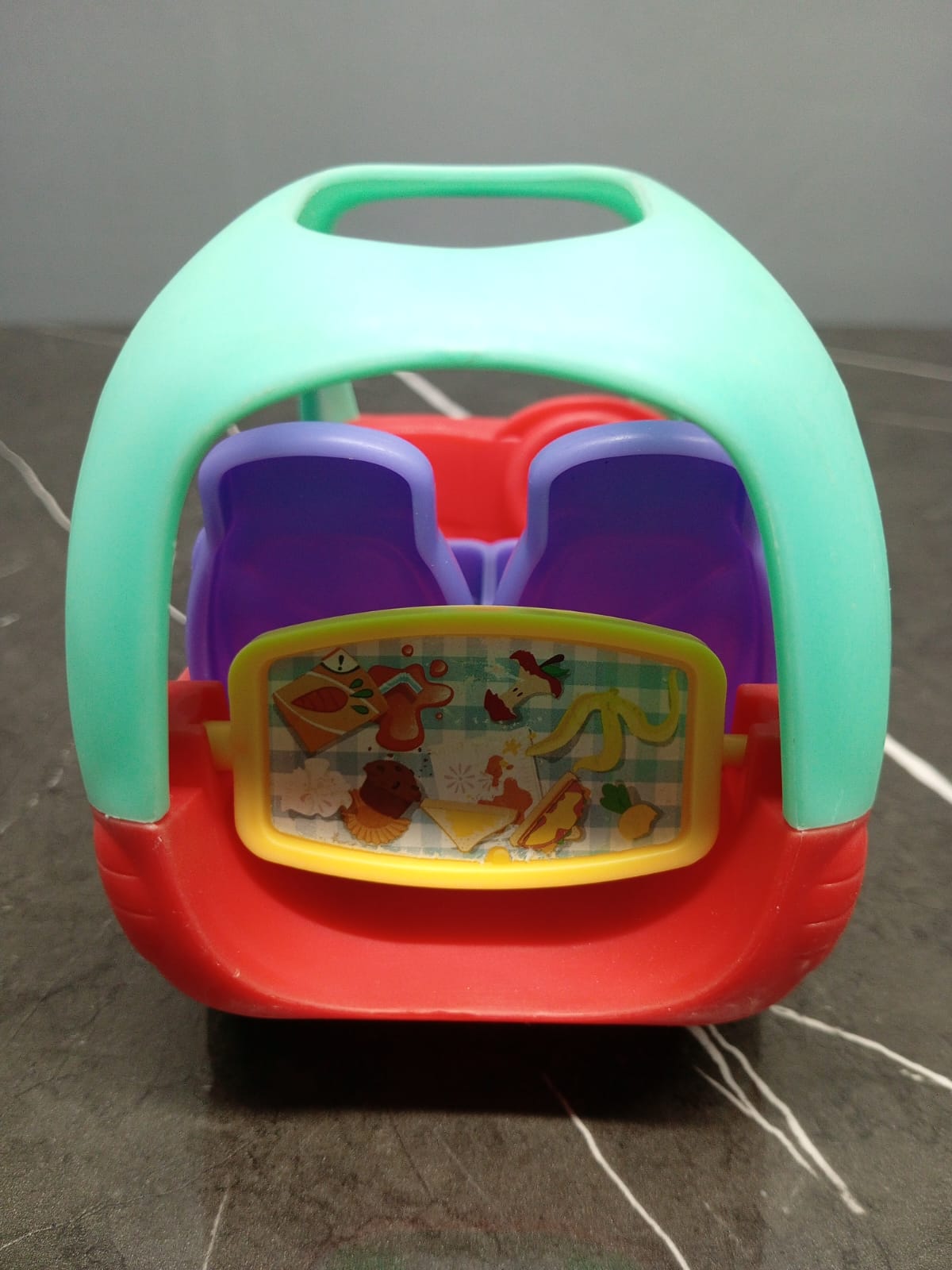 Red and Aqua Toy Car
