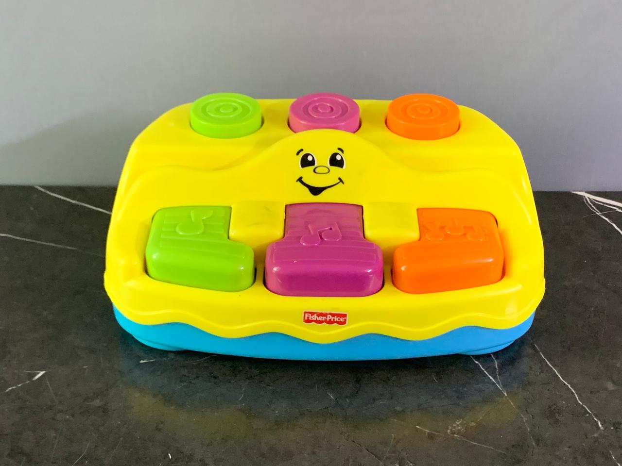 Fisher-Price Peek-A-Boo Piano.