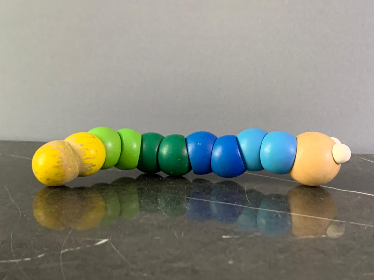 Wooden Articulated Caterpillar Toy. SKU:BXL-043 (8/10 condition)