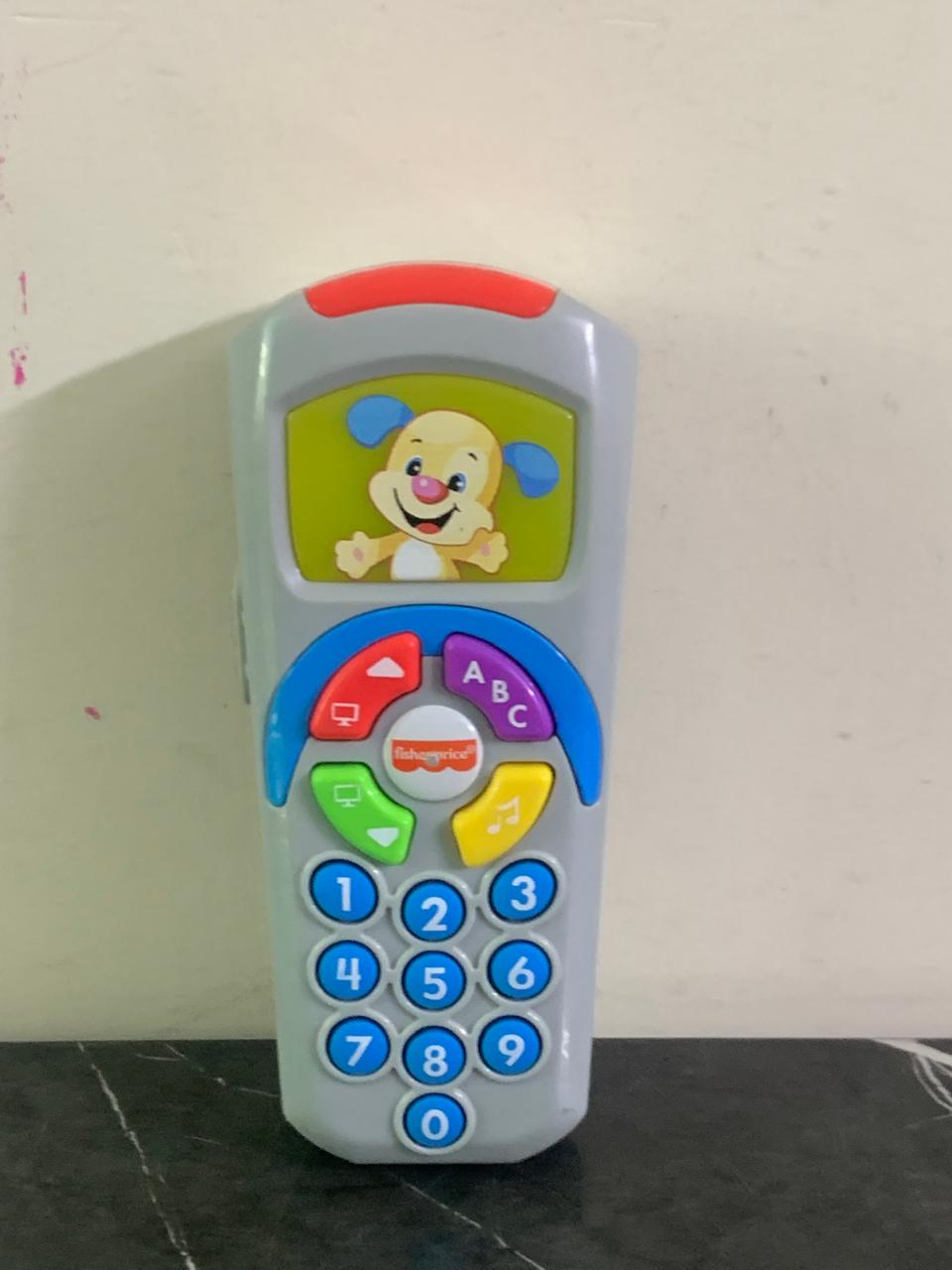 Fisher-Price Baby Learning Toy Laugh & Learn Puppy’s Remote. SKU:BXL-025