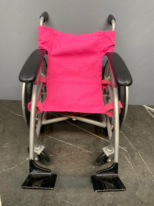 Our Generation Pink Wheelchair.