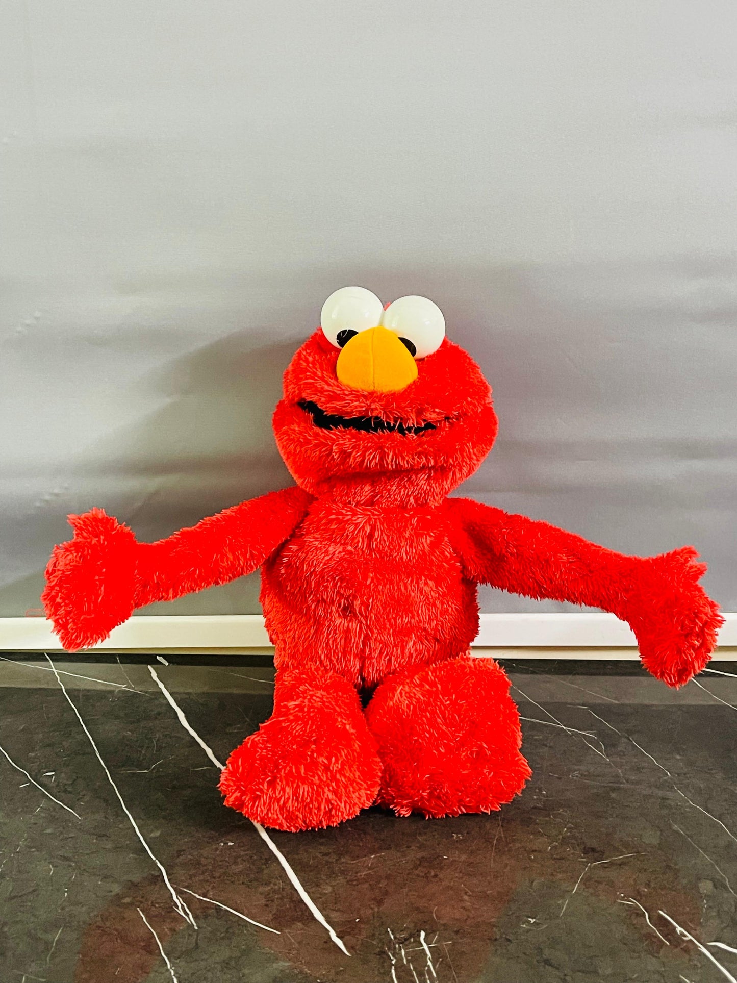 Sesame Street Big Hugs Talking and Singing Elmo. SKU:BXL-804 (Rs 400 advance)