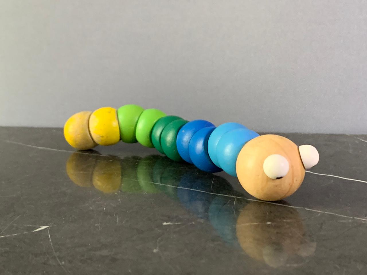 Wooden Articulated Caterpillar Toy. SKU:BXL-043 (8/10 condition)