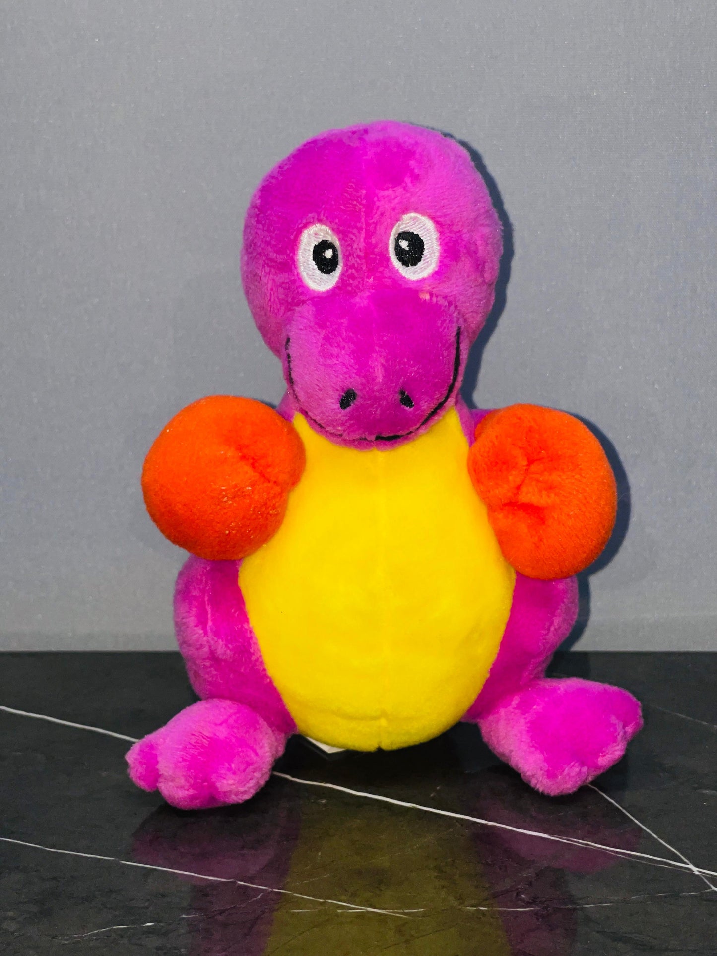 Cheerful Purple and Yellow Dino Plush