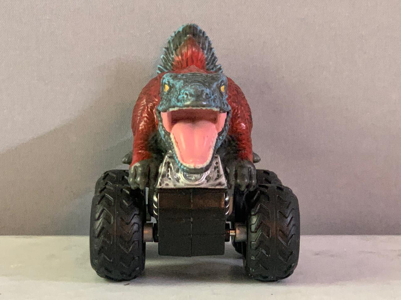 Jurassic World Zoom Riders Pyroraptor Pullback Vehicle.