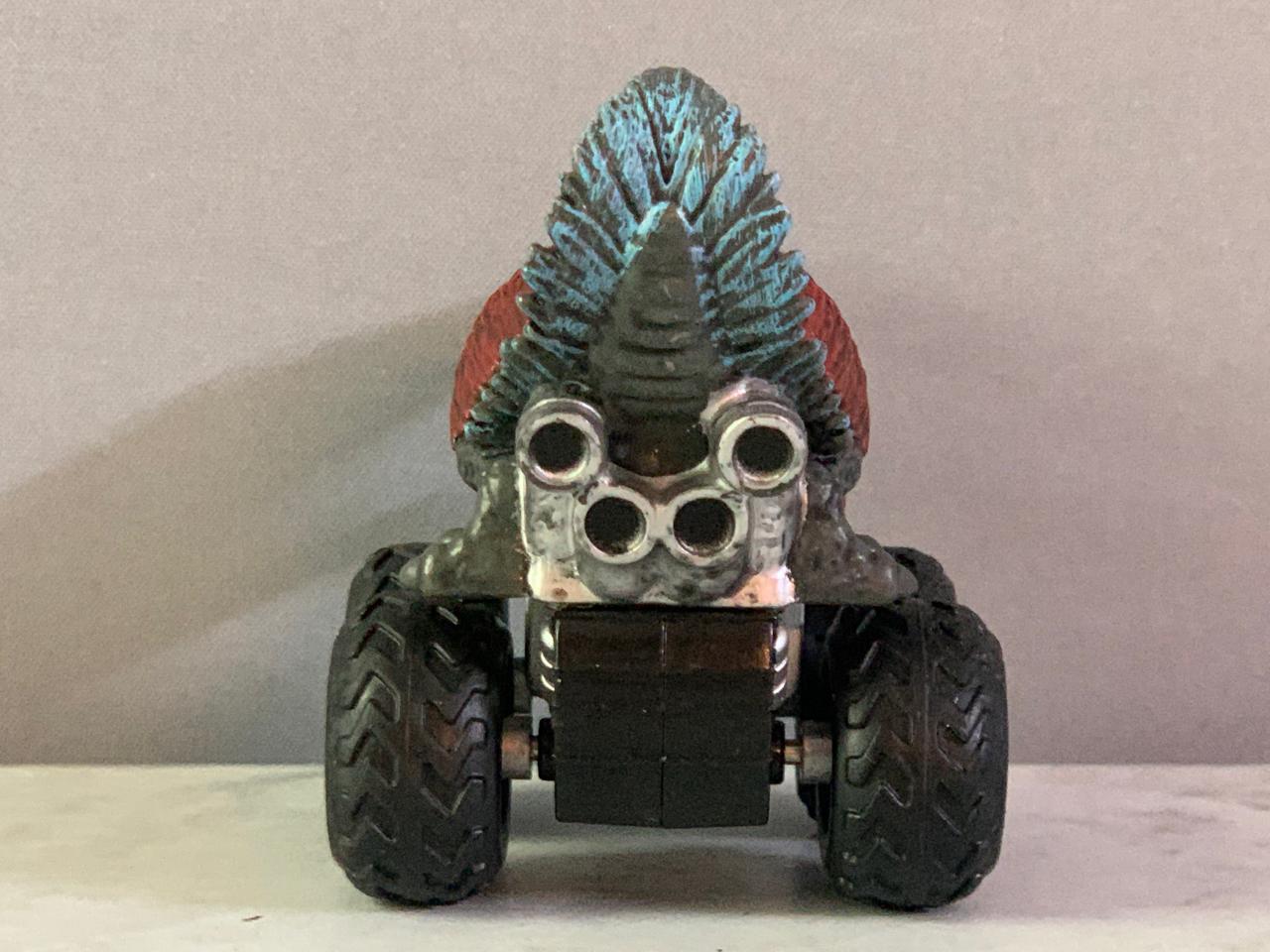 Jurassic World Zoom Riders Pyroraptor Pullback Vehicle.