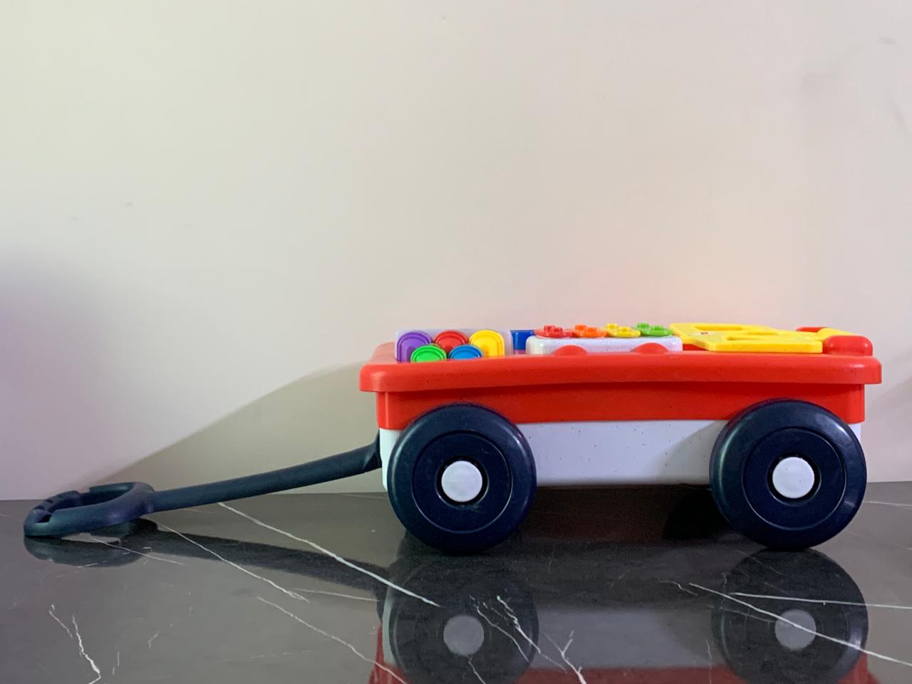 Fisher-price Laugh & Learn Pull & Play Learning Wagon. (Without shapes)(Rs 500 advance) SKU:BXL-804