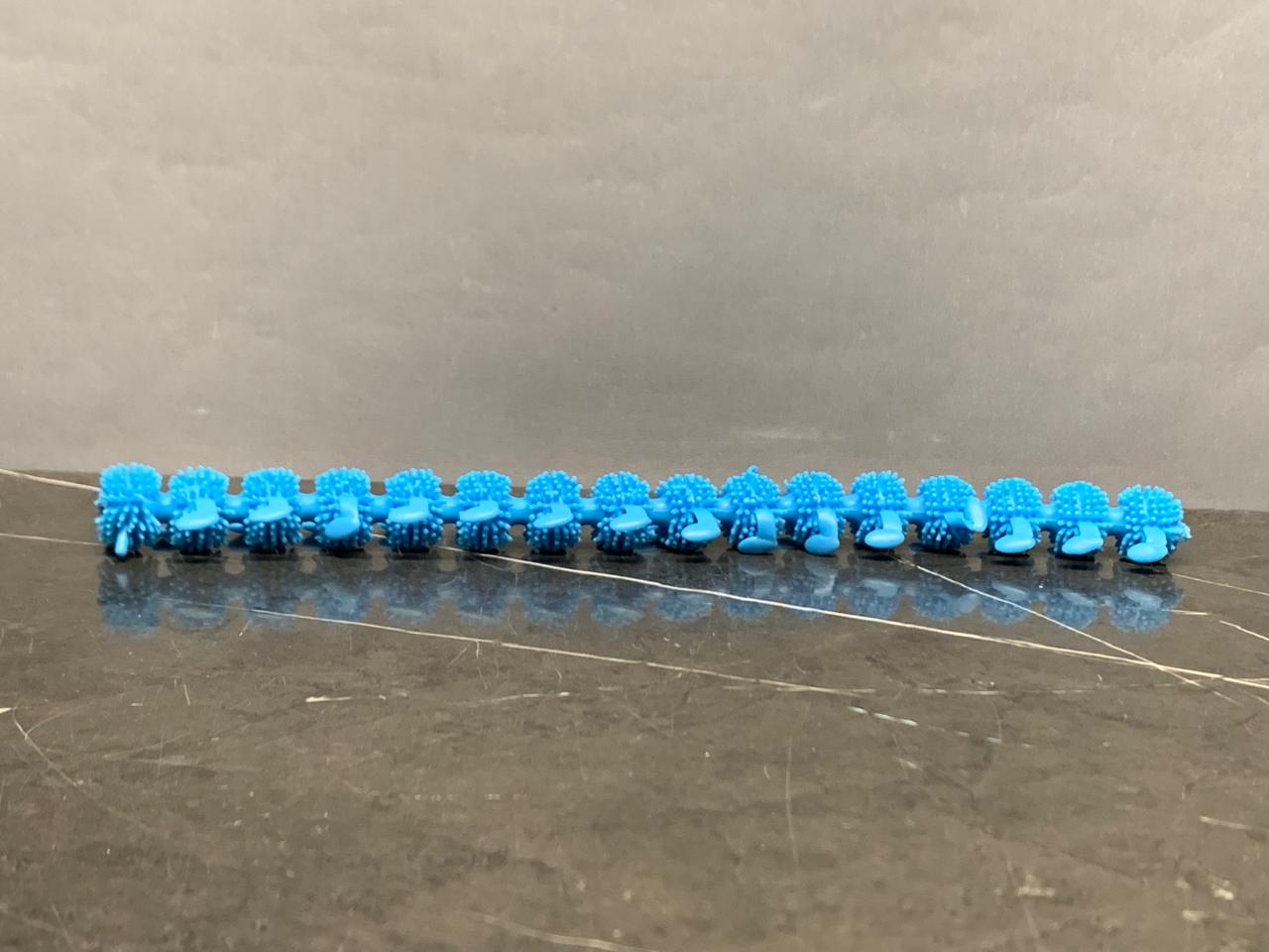 TOYSMITH COLORFUL CRAWLIES STRETCH CATERPILLAR. SKU:BXL-109