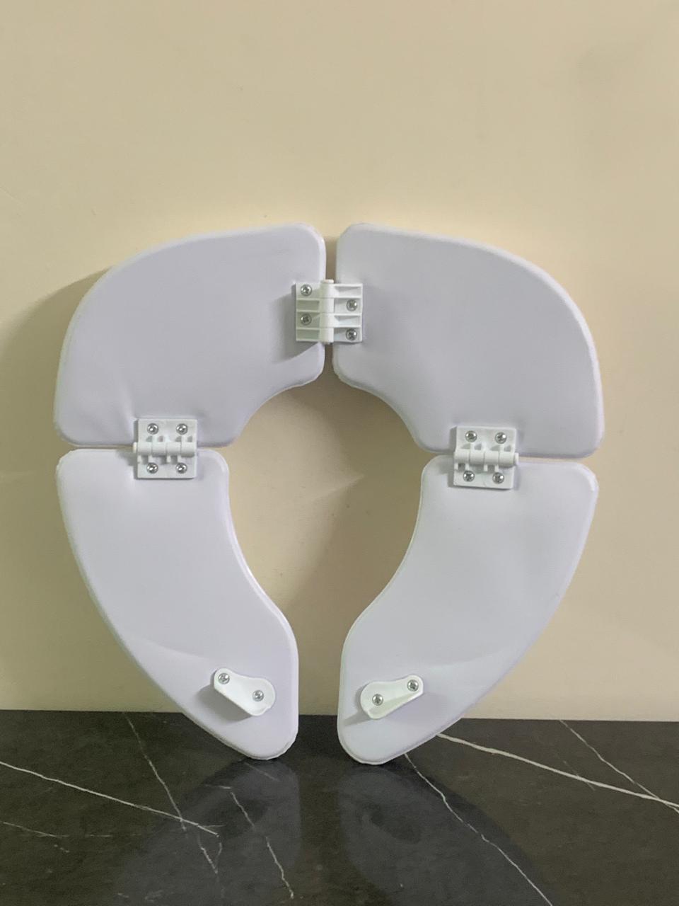 Baby U Cushie Traveller Folding Padded Toilet Seat. SKU:BXL-005