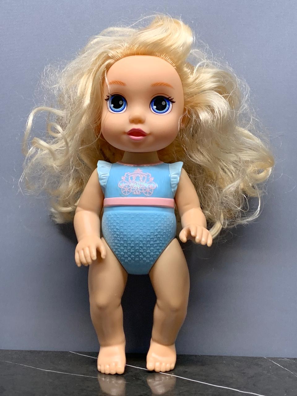 Blonde-Haired Baby Doll in Blue Swimsuit