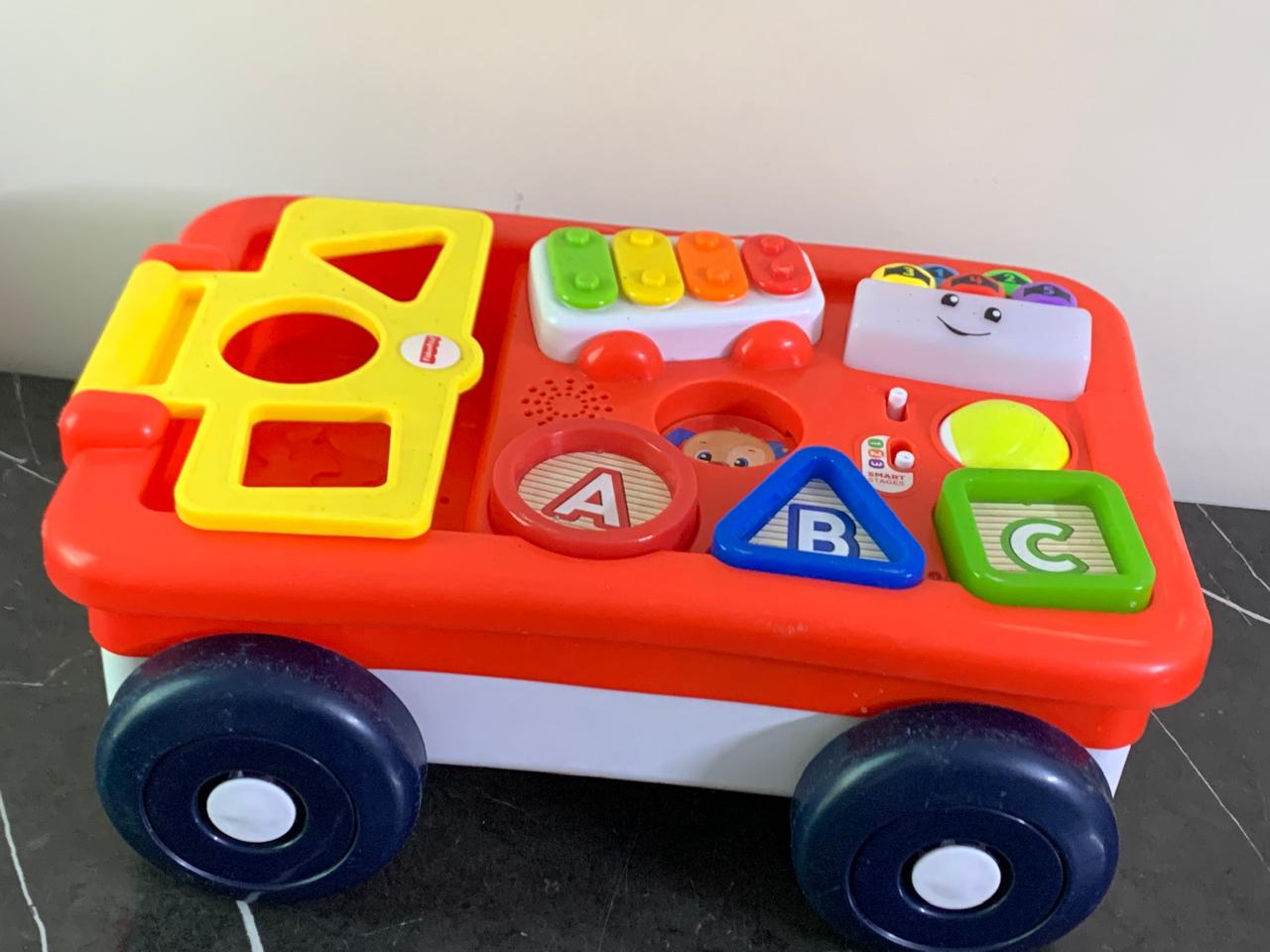 Fisher-price Laugh & Learn Pull & Play Learning Wagon. (Without shapes)(Rs 500 advance) SKU:BXL-804