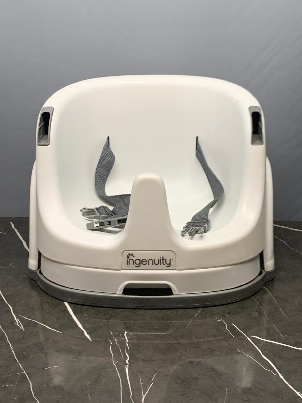 Ingenuity Baby Base 2-in-1 Booster Seat. (Rs 500 advance)