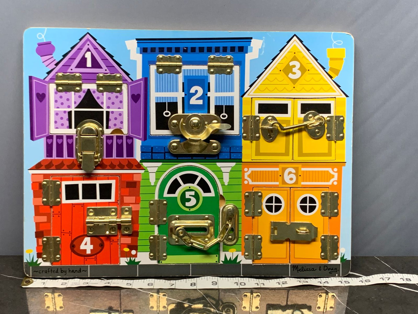 Melissa & Doug Wooden Latches Board. (500 advance)